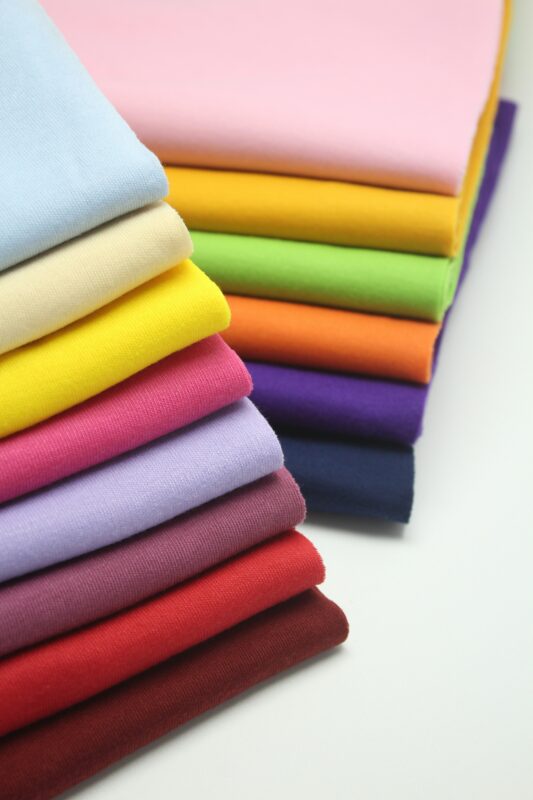 Fabric and stitching detail during uniform production